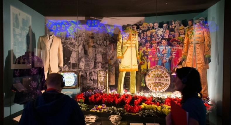 Original and replica costumes from The Beatles used on the album cover of Sgt. Pepper's Lonely Hearts Club Band are displayed at the V&A museum in London