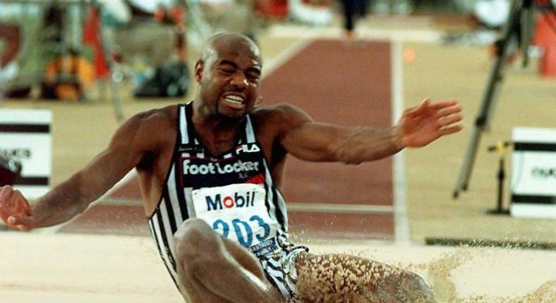 Mike Powell, seen here in 1996, owns the world record after an 8.95 metre jump in 1991