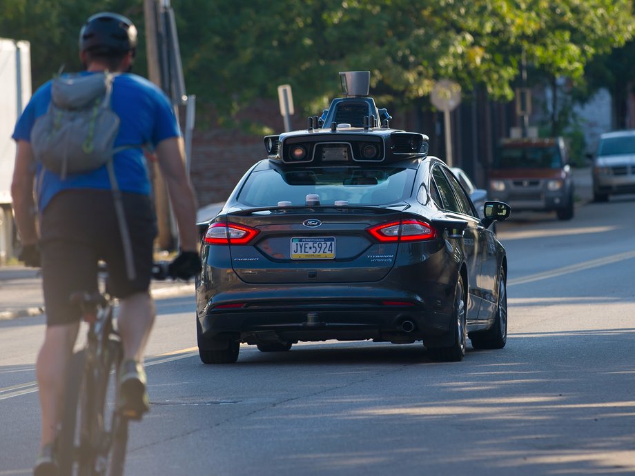 An Uber driverless Ford Fusion drives down Smallman Street on September, 22, 2016 in Pittsburgh, Pennsylvania.