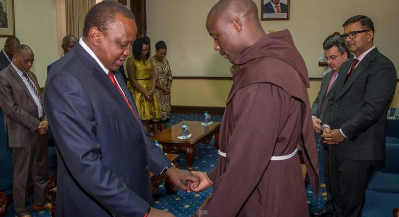 President Kenyatta with teacher Peter Tabichi