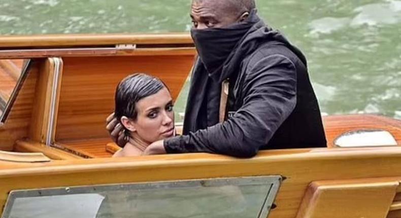 Kanye West, 46, (right) and his Australian 'wife' Bianca Censori, 28, (left) have been banned for life by a Venetian boat rental company following their indecent exposure scandal in Italy last Monday