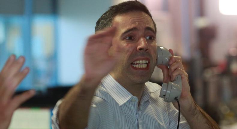 Traders from BGC, a global brokerage company in London's Canary Wharf financial centre react as European stock markets open early June 24, 2016 after Britain voted to leave the European Union in the EU BREXIT referendum.