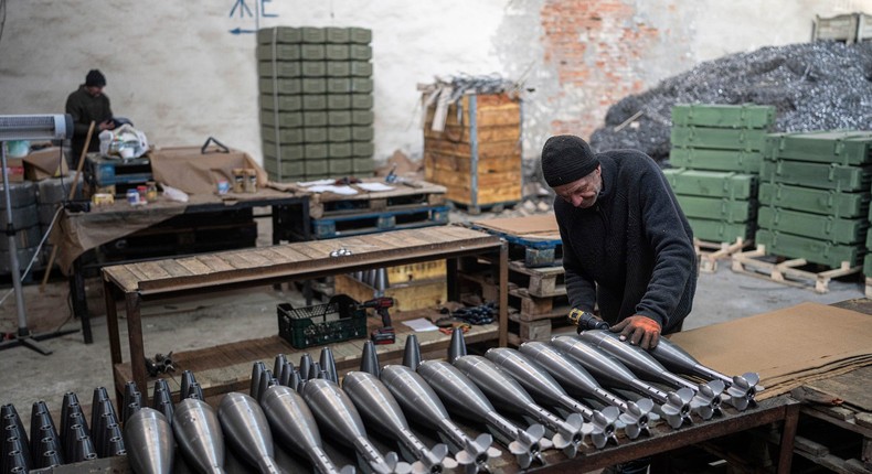 A worker assembles mortar shells at a factory in Ukraine.AP Photo/Evgeniy Maloletka