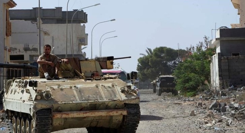 An armoured vehicle of Libyan forces allied with the U.N.-backed government is pictured during a battle with Islamic State militants in neighbourhood Number Three in Sirte, Libya October 9, 2016. 