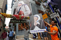 A man holds a poster of Mother Teresa outside the  Missionaries of Charity building in Kolkata as she was canonised during a ceremony held in the Vatican