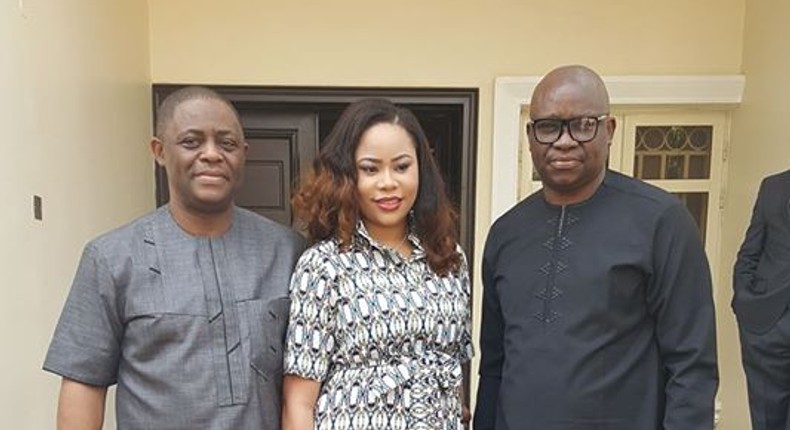 Ekiti State Governor, Ayo Fayose with former aviation minister, Femi Fani-Kayode and wife, Precious Chikwendu.