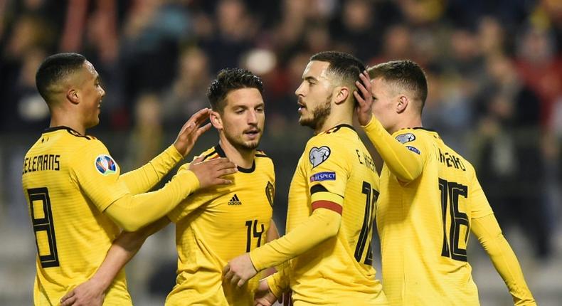 Eden Hazard won and converted the decisive penalty in Belgium's win over Russia in Brussels