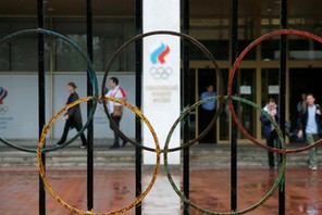 People walk out of the Russian Olympic Committee headquarters in Moscow