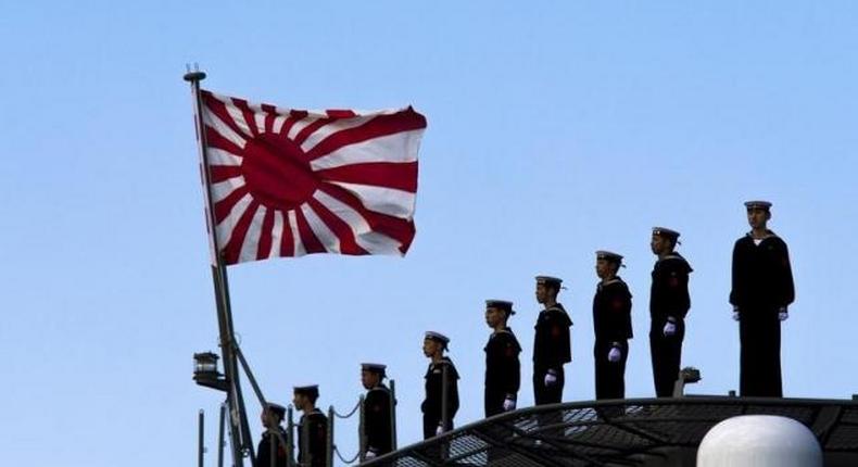 China says Japan defence review misleading, Japan releases photos