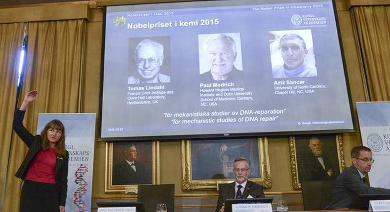 Professors Sara Snogerup Linse, Goran K. Hansson and Claes Gustafsson, members of the Nobel Assembly, talk to the media at a news conference at the Royal Swedish Academy in Stockholm October 7, 2015. Sweden's Tomas Lindahl, the U.S.-based Paul Modrich and Turkish-born Aziz Sancar won the 2015 Nobel Prize for Chemistry for work on mapping how cells repair damaged DNA, the award-giving body said on Wednesday. REUTERS/Fredrik Sandberg/TT News Agency