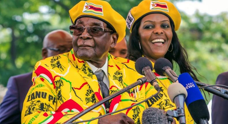 Robert Mugabe and his wife Grace, pictured at a rally on November 8 2017 -- one of their last appearances before his fall from power