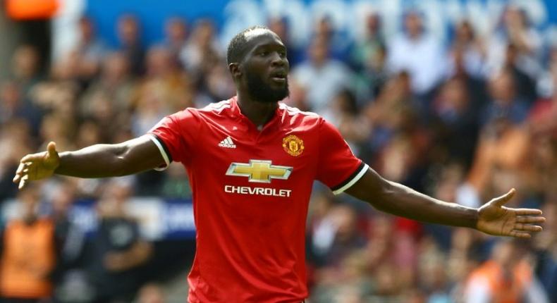 Manchester United's striker Romelu Lukaku celebrates scoring the team's second goal during the English Premier League football match against Swansea City August 19, 2017