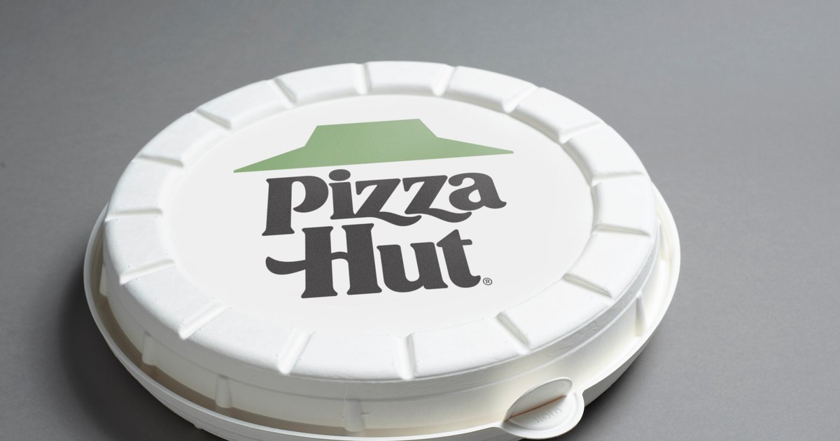 Download Pizza Hut is testing a new round pizza box that looks like a spaceship and is meant to keep ...