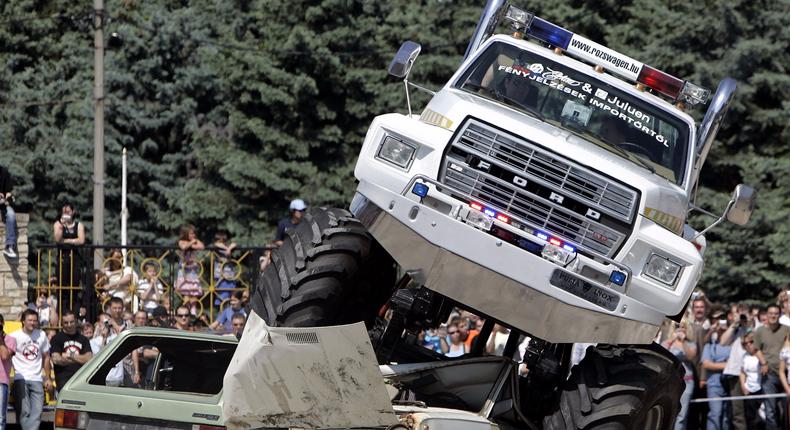 A Big Foot goes over cars during the two-day ROD and Custom International Auto Motor exhibition in Budapest May 19, 2007.