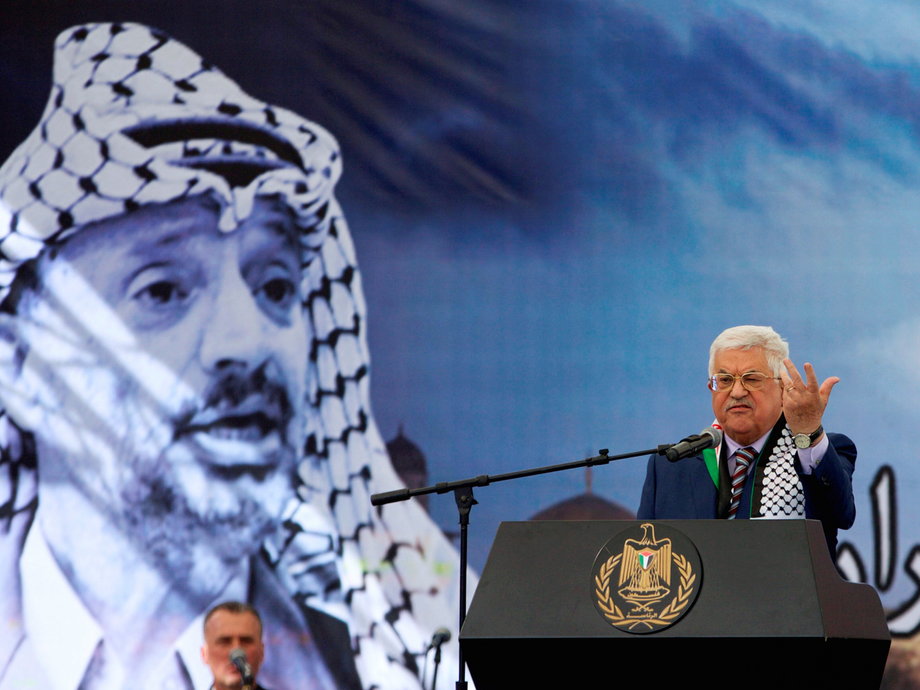 Palestinian President Mahmoud Abbas gestures as he delivers a speech during a rally marking the 12th anniversary of Palestinian leader Yasser Arafat's death, in the West Bank city of Ramallah November 10, 2016.