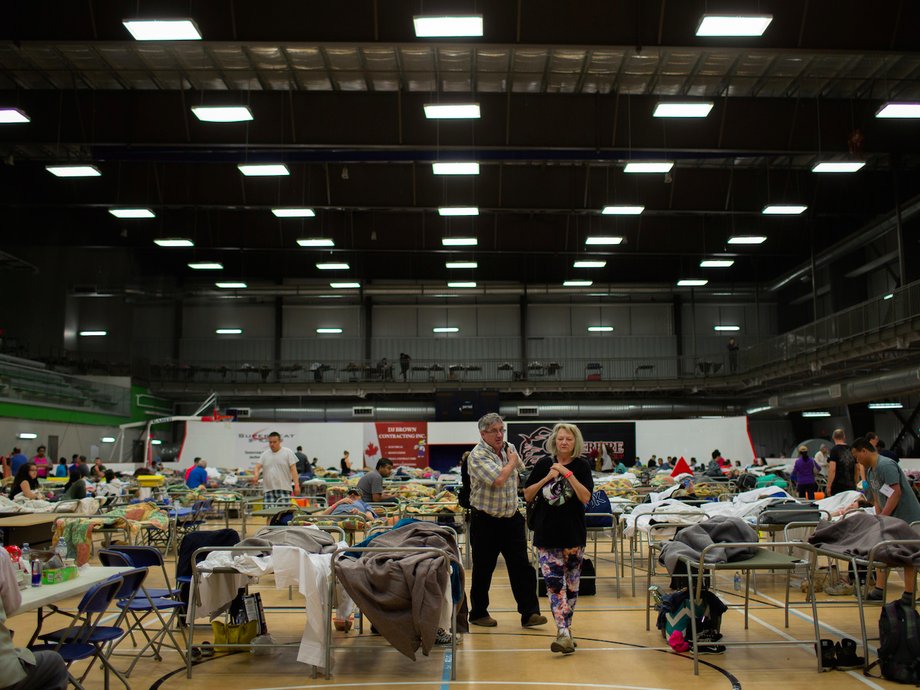 Neighboring communities have opened up their towns to the Fort McMurray residents, some of whom may no longer have homes to go back to after the evacuation.