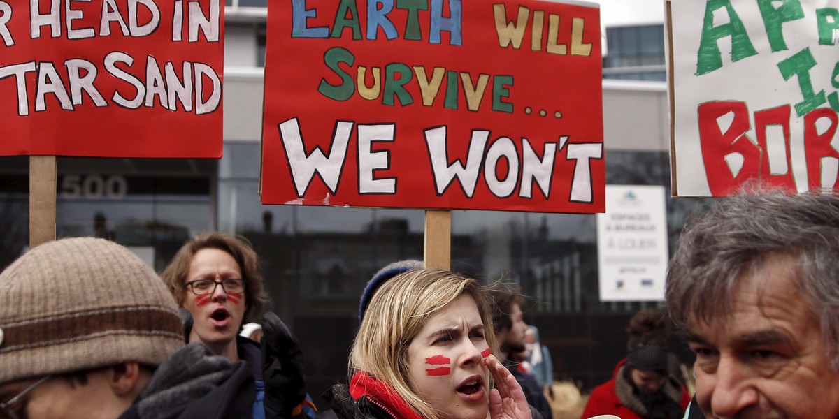 People protest against climate change during a demonstration in Quebec City April 11, 2015.