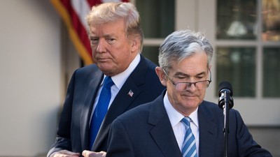 Donald Trump and Federal Reserve Chair Jerome PowellDrew Angerer/Getty Images