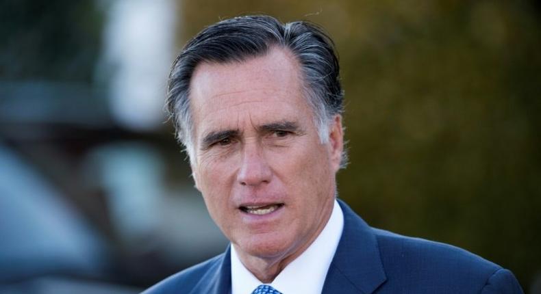 Mitt Romney leaves after meeting with US President-elect Donald Trump at the clubhouse of Trump National Golf Club on November 19, 2016 in Bedminster, New Jersey