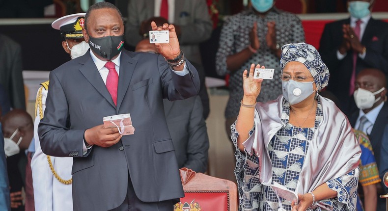 President Uhuru Kenyatta with First Lady Margaret Kenyatta after they received their Huduma Namba cads