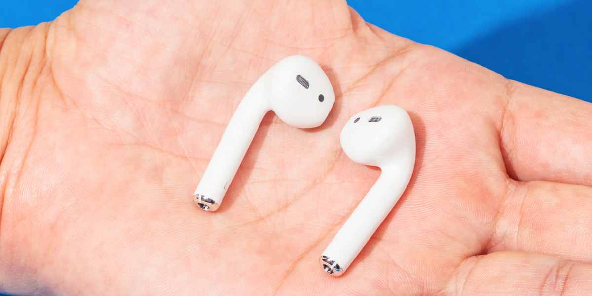 Cheeky AirPods waiting for you to lose them.