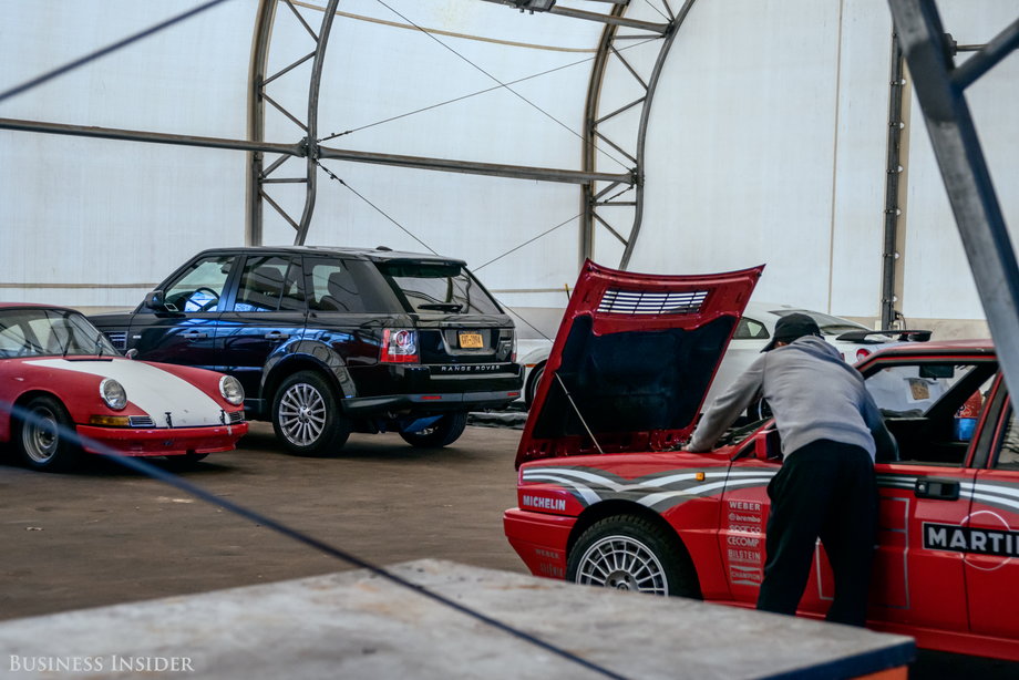 A Lancia Delta Integrale (right), a highly revered off-road racer, is a strange sight in the United States — let alone as a road-legal car. A Porsche 912, missing much of its paint and interior, is currently the club's "rat rod" project car.