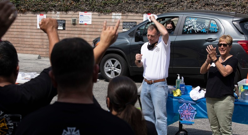 Mike Miller, vice president of the International Alliance of Theatrical Stage Employees (IATSE) speaks to members at a rally on on Sunday, Sept. 26, 2021.
