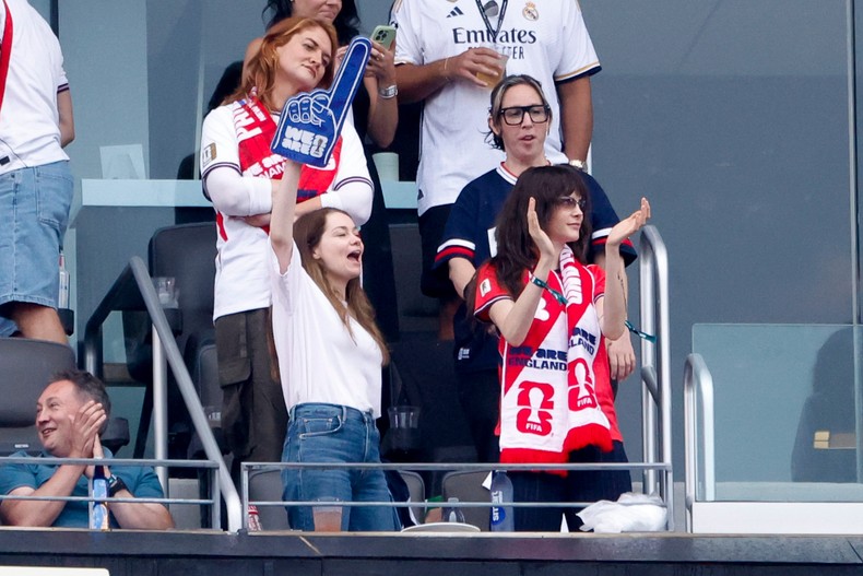 Delevingne, bottom right, is a born-and-raised Londoner, so it was no surprise to see her in the stands for England's match against Panama on June 27.
