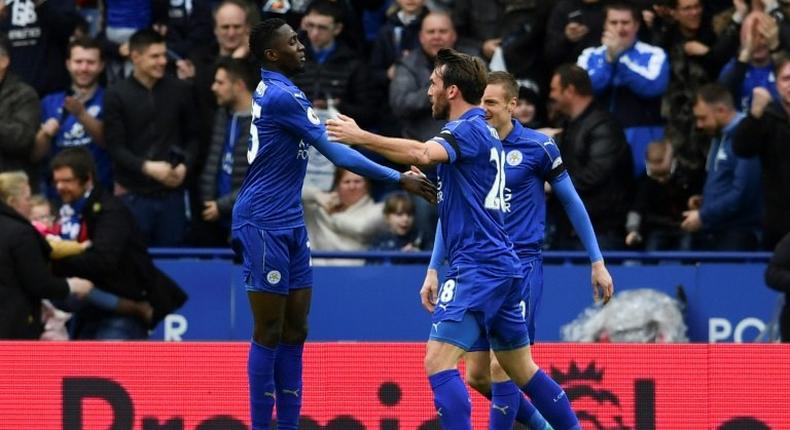 Leicester City's Wilfred Ndidi (L) celebrates scoring their opening goal against Stoke City at King Power Stadium in Leicester, central England on April 1, 2017