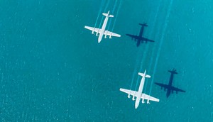 Russian anti-submarine aircraft fly during joint naval and air drills with China in September.Russian Defense Ministry Press Service via AP