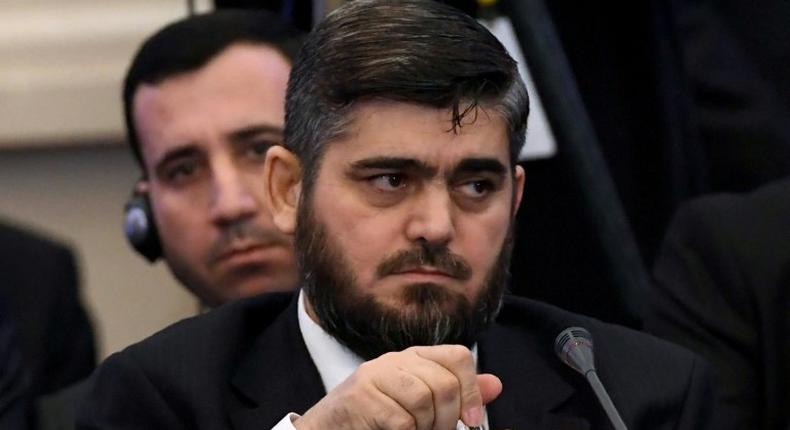 Chief rebel negotiator Mohammad Alloush attends the first session of Syria peace talks at Astana's Rixos President Hotel on January 23, 2017