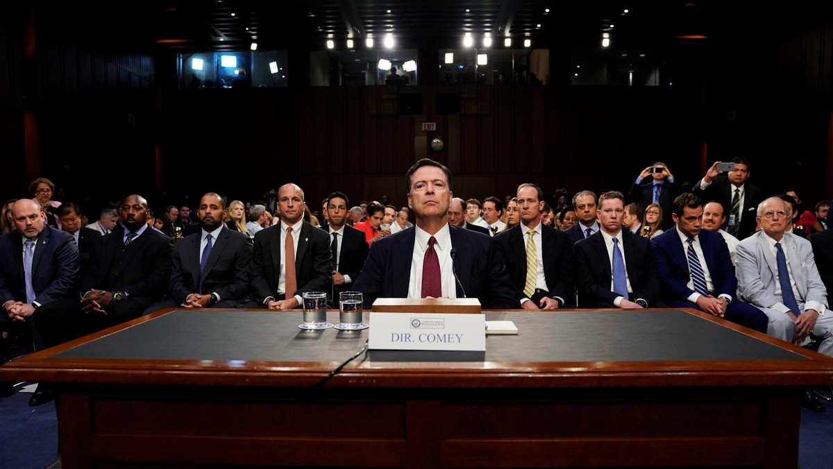 Former FBI Director Comey testifies before a Senate Intelligence Committee hearing in Washington