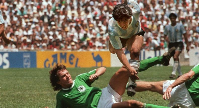 Diego Maradona evades a tackle from Lothar Matthaus in the 1986 World Cup final which saw Argentina beat West Germany 3-2