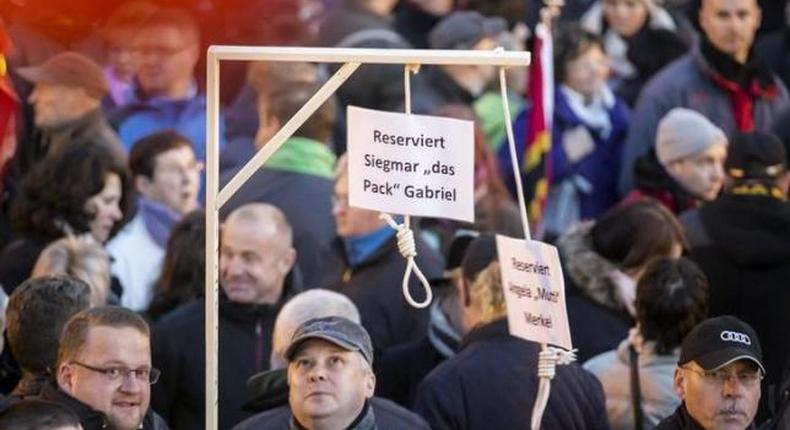 Germany investigates mock gallows for Merkel at anti-Islam rally