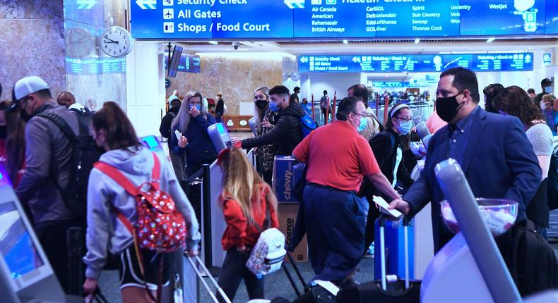 People arrive at Orlando International Airport on November 25, 2020 in Orlando, Florida.
