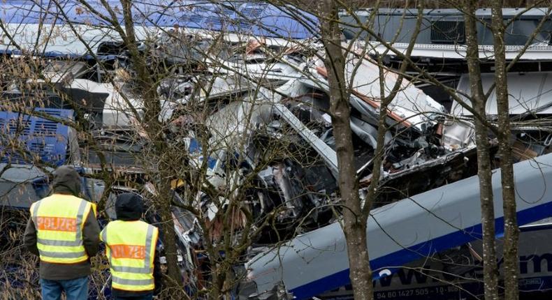 German police inspect the site of a train accident near Bad Aibling in February 2016