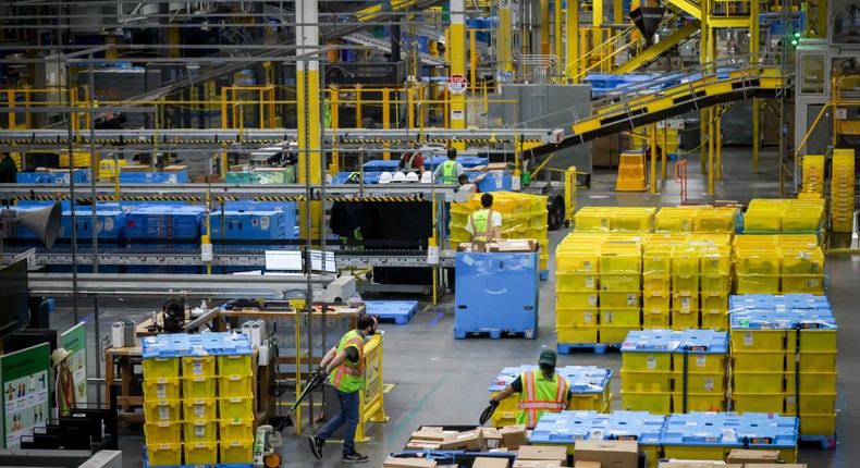 Amazon's next warehouse efficiency drive is about moving humans, not ...