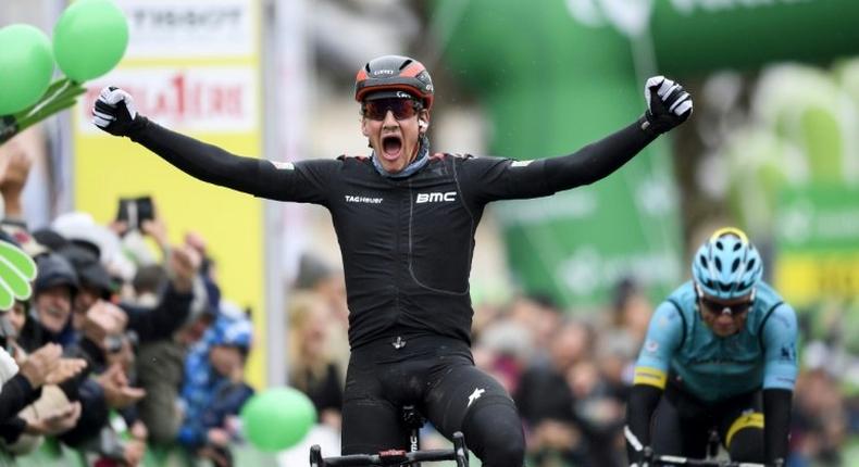 Swiss Stefan Kung celebrates after winning the second stage of the Tour of Romandie