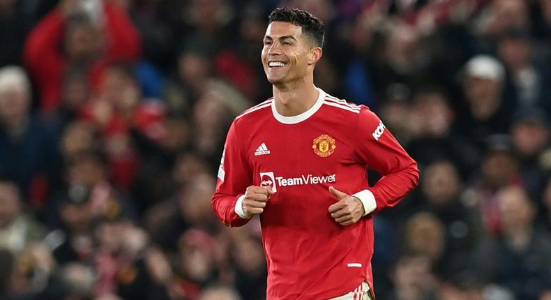 Cristiano Ronaldo celebrates after scoring Manchester United's winning goal against Atalanta Creator: Paul ELLIS