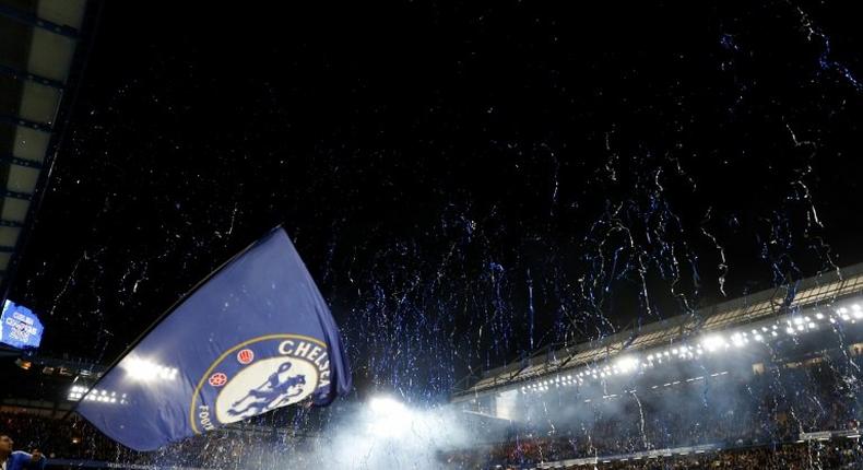 Streamers errupt over the pitch at the end of the English Premier League match against Watford at Stamford Bridge