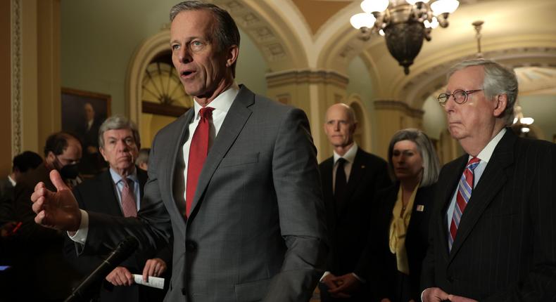 Sen. John Thune alongside Senate Minority Leader Mitch McConnell at a news conference.