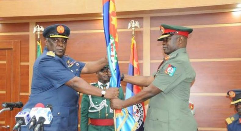Former Chief of Defence Staff, Air Chief Marshall Alex Badeh hands over to successor, Major General Abayomi Gabriel Olonishakin on July 21, 2015.