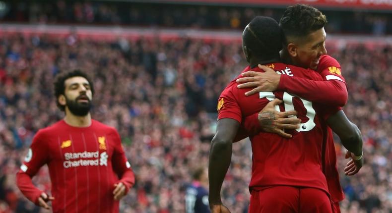 Mohamed Salah (left),  Sadio Mane (centre)and Roberto Firmino (right)have scored a combined 248 goals for Liverpool in the past four seasons