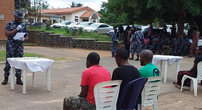 The Police Public Relations Officer in Oyo State, SP Osifeso, parading 10 suspected armed robbers and car snatchers at the command’s headquarters, Eleyele, Ibadan on Friday. [NAN]