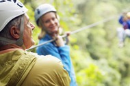 Group of People Rappelling