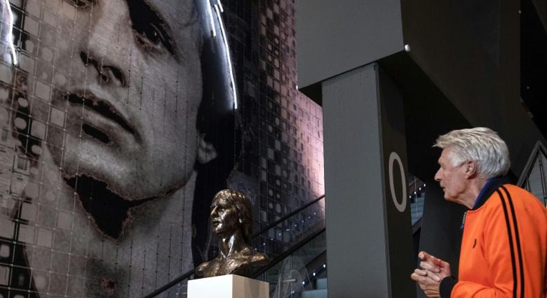 Wim Suurbier looks at a sculpture of former teammate Johan Cruyff at the Johan Cruyff ArenA in Amsterdam in January 2019