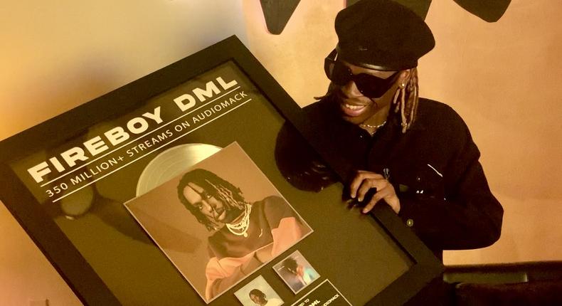 Fireboy DML receives plaque from Audiomack for hitting over 350 million streams
