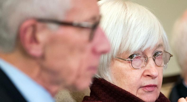 Federal Reserve Board Chair Janet Yellen, center, sits between board Vice Chair Stanley Fischer, left, and member Daniel Tarullo during an open meeting in Washington, Thursday, Dec. 15, 2016.