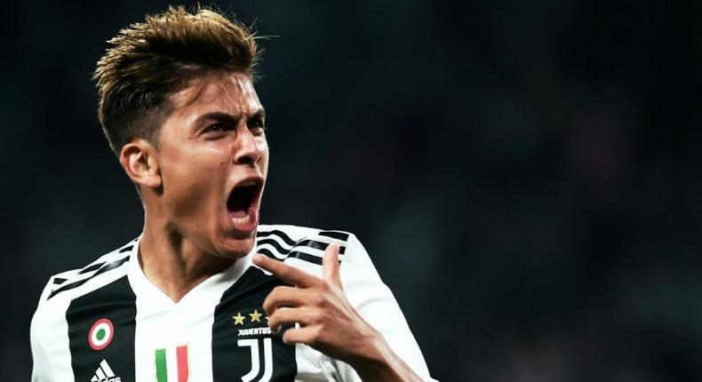 Off the mark: Paulo Dybala gets his first goal this season for Juventus.