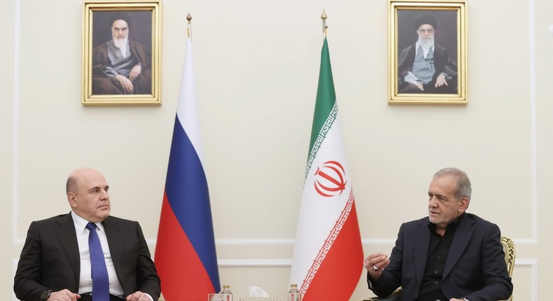 Iranian President Masoud Pezeshkian with Russian Prime Minister Mikhail Mishustin in Tehran, Iran, on September 30, 2024.Photo by Iranian Presidency / Handout/Anadolu via Getty Images